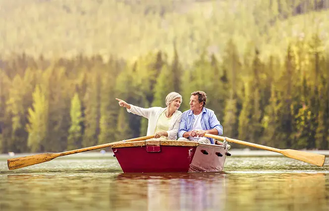 Senior couple in row boat