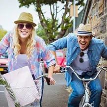 Couple riding bikes