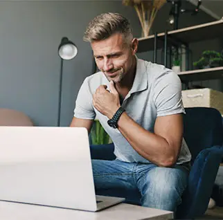 Man sitting at laptop